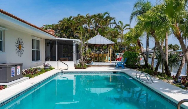 Cocoa Beach Waterfront Home with Tiki Bar and Pool