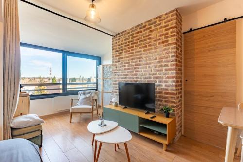 Cocon Cosy & Design avec Briques et Poutres