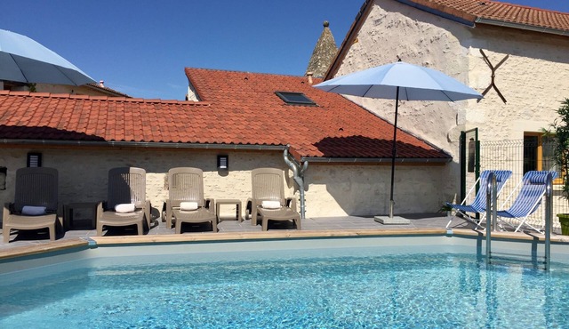 Collection of boutique cottages around a courtyard with pool & garden, sleeps 15