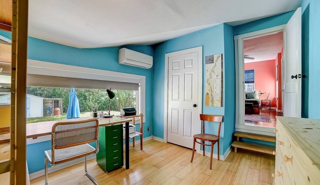 Colorful dog-friendly home near downtown with back patio, streaming, desk, AC