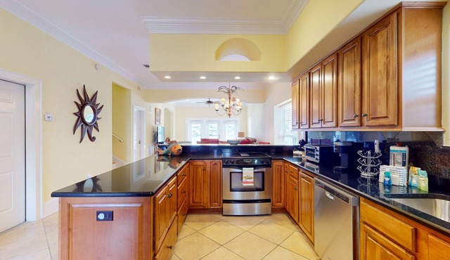 Colorful end unit townhome with resort amenities, sound views, W/D, & AC