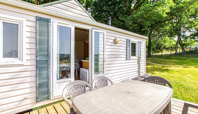 Colorful mobile home with panoramic view of the surrounding landscape