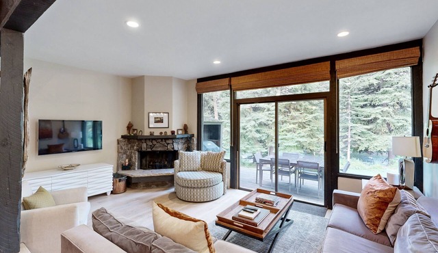 Colorful Riverfront Chalet with Shared Pool and Hot Tub - Close to Ski Slopes