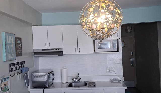 Come chill with us. Enjoy this cozy condo with beach access and a pool.