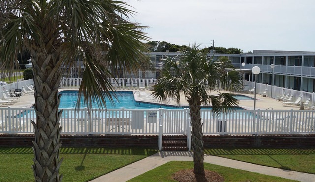 Come for the beach, stay for the memories. Enjoy free beach access & huge pool!