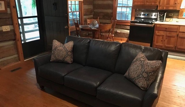 Come to the mountains to a rustic cabin by a creek.