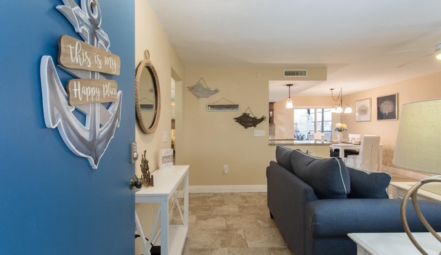 Come to your HAPPY PLACE! 2/2 ground floor waterfront community Condo!