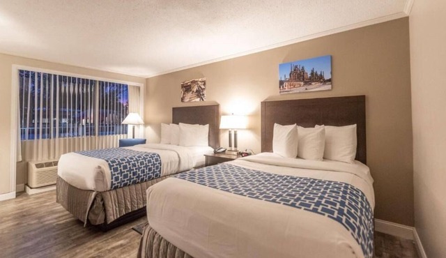 Comfort and Convenience! Onsite Pool, Free Breakfast, Parking!