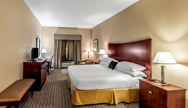 Comfort Meets Affordability at Red Lion Inn & Suites Mineral Wells! Onsite Pool!