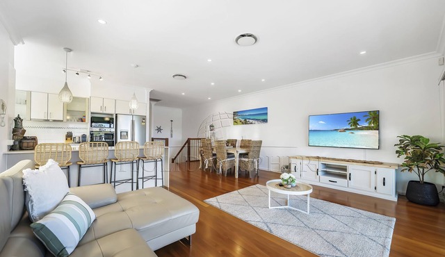 Comfort meets eloquent design in this impressive four-bedroom duplex!