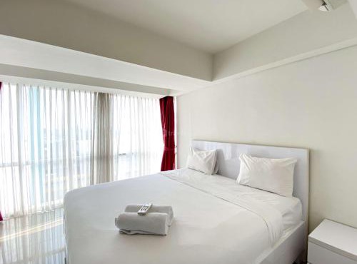 Comfort Stay and Homey 2BR Apartment at H Residence By Travelio