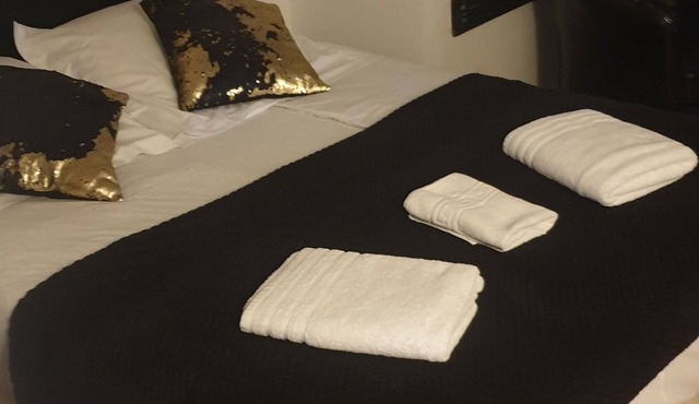 Comfortable rooms in a 16th-century building in the town center.