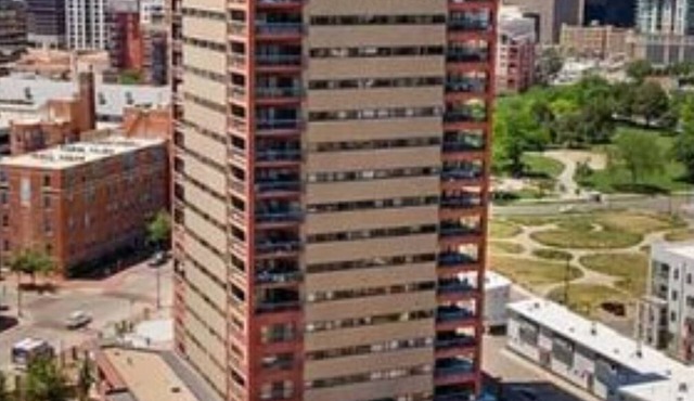 Comfortable 1-bedroom condo in Uptown Denver district; gym, pool & meeting rooms