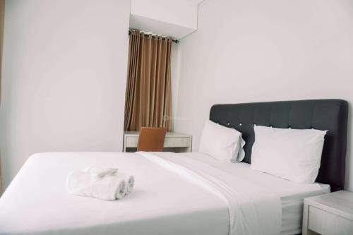 Comfortable and Homey 2BR at Transpark Bintaro Apartment By Travelio