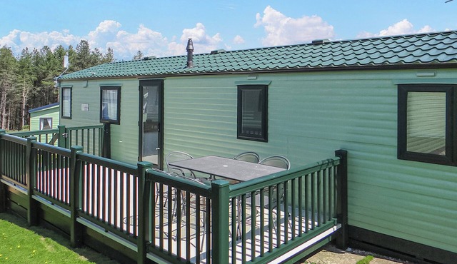 Comfortable and spacious 12ft-wide caravan with one double and one twin.