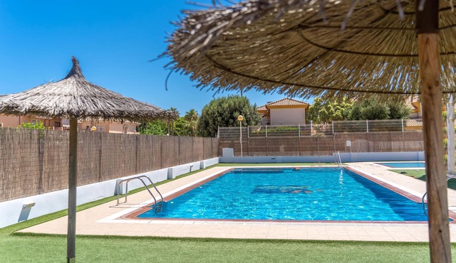 Comfortable apartment with shared pool near the beach.