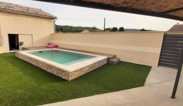 Comfortable apartment with swimming pool and barbecue area.