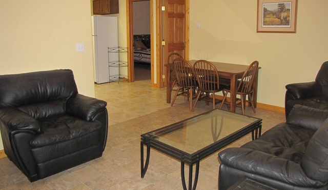Comfortable basement apartment on Little Sheep Creek at foot of Lima Peaks