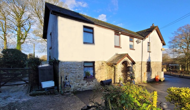 Comfortable character cottage with small garden on smallholding. Pets welcome.