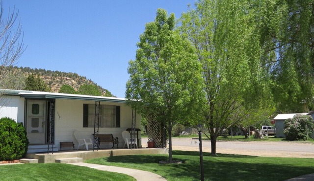 Comfortable family home on quiet street in center of magnificent parks!