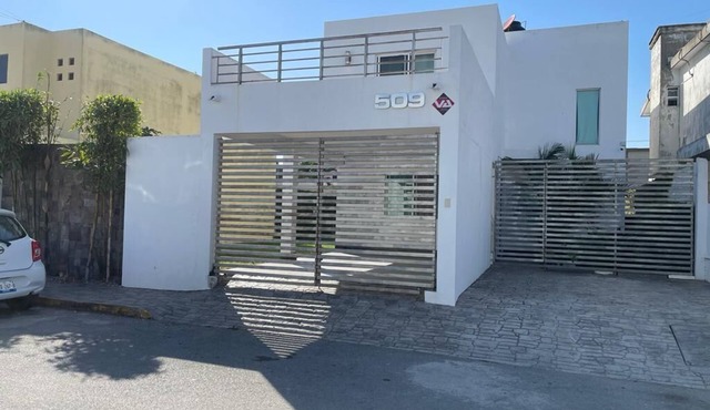 Comfortable family home close to the beach and with a large yard for your pet.