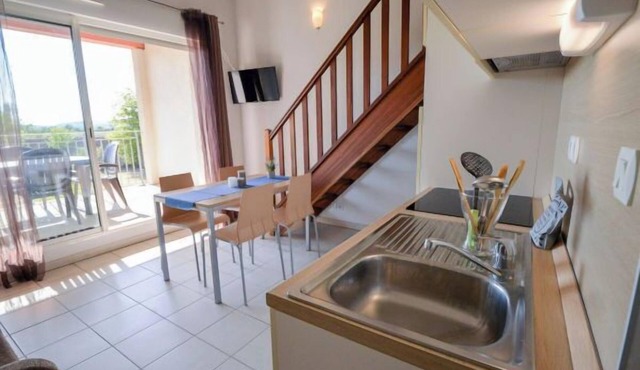 Comfortable Family Units with Kitchenettes & Seasonal Pool Access