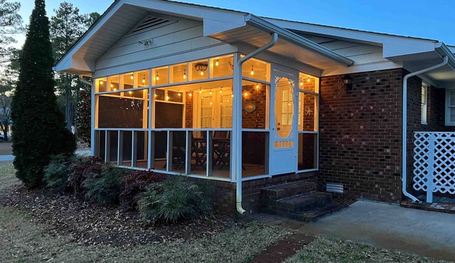 Comfortable home near beach with enclosed porch, washer/dryer, & central AC