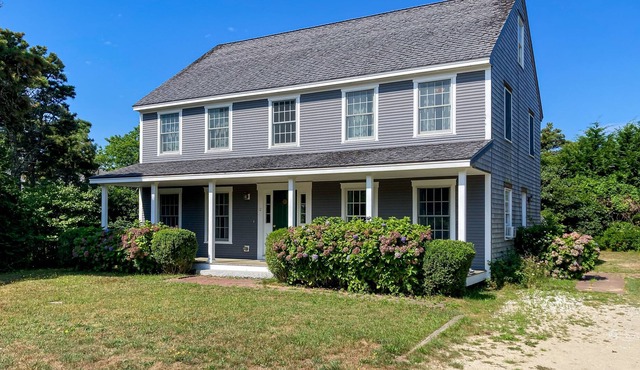 Comfortable home near beaches, town, & airport with patio, WiFi, grill, & W/D