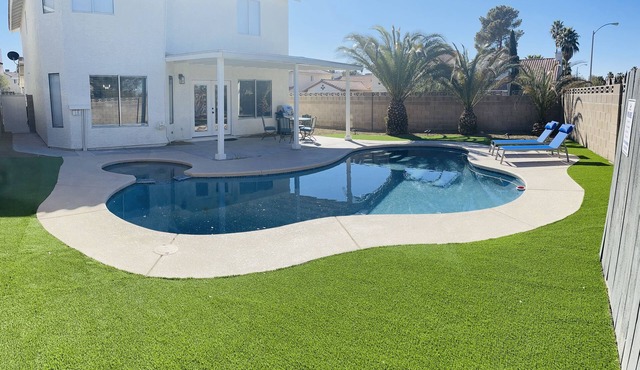 Comfortable home with sparkling private pool minutes to the Strip!