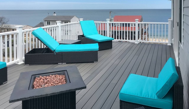 Comfortable home with rooftop deck, beach & water views, W/D, & central AC