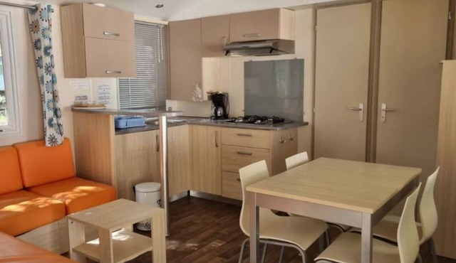 Comfortable mobile home with terrace at Neffes campsite