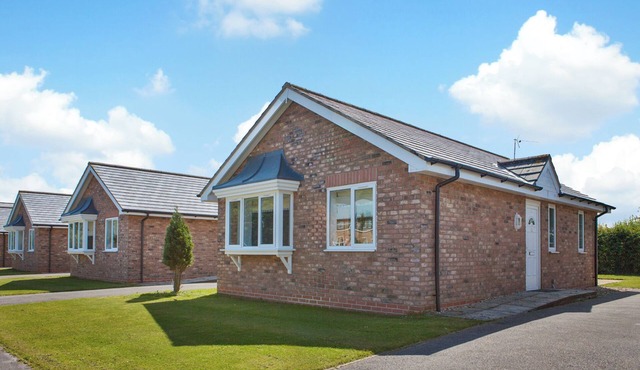 Comfortable modern cottage with one double and one with adult size bunks.