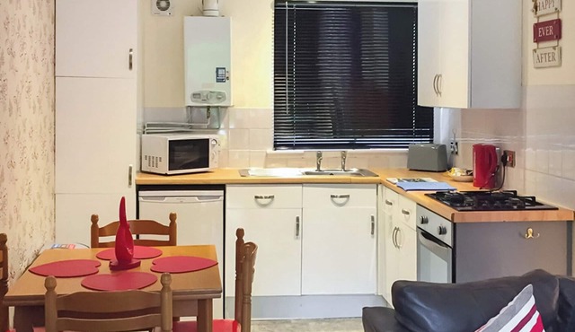 Comfortable semi-detached lodge with one double and one twin.