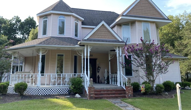Comfortable Victorian home with yard for outdoor enjoyment in rural Fannett