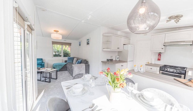 Comfortable, well located lodge at popular White Cross Bay Holiday Park with access to the Lake