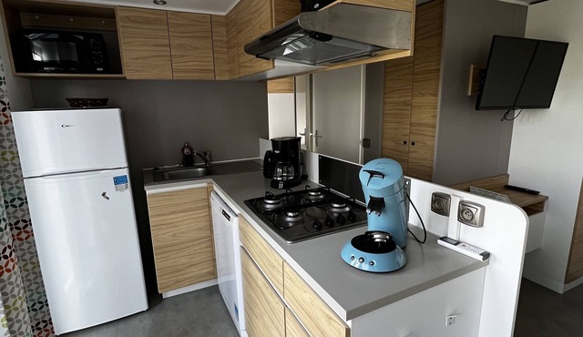 Comfortable wooden cottage with master suite and heated pool