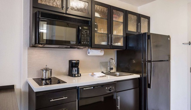 ComfortZone Suites: Fully-Equipped Stays for Your Every Need