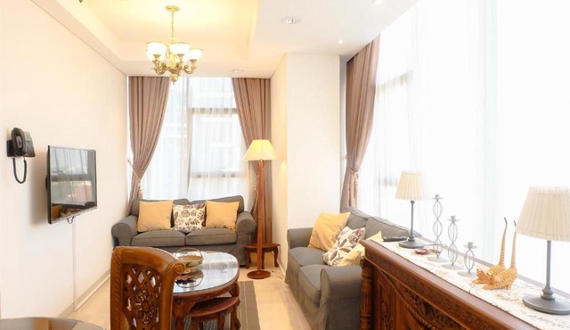 Comfy 2BR L'Avenue Apartment By Travelio