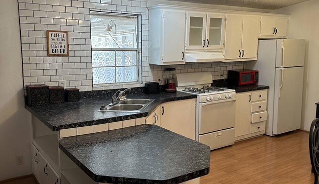 Comfy country home for the whole family with private patio and BBQ.