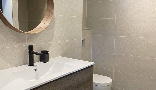 Completely renovated 1-bedroom studio with private parking