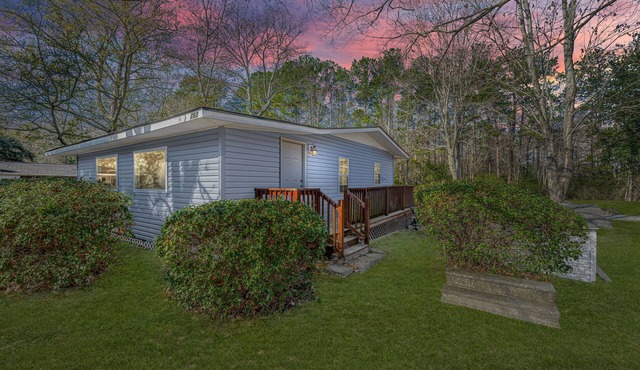 Completely renovated lake house with boat landing, dock, fire pit and deck!