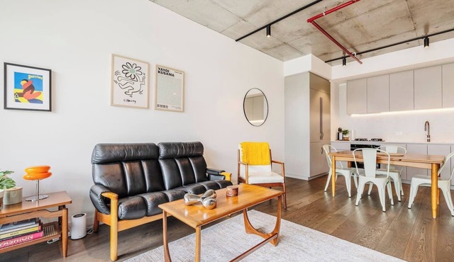 Concrete Junction Sunny Industrial Balcony Haven