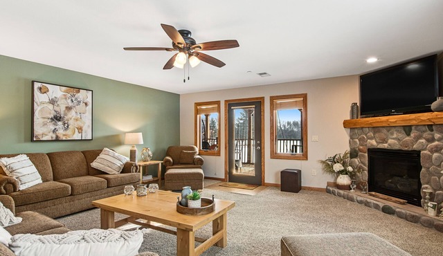 Condo at waterfront resort with golf course views, central AC, W/D, & pool