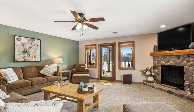 Condo at waterfront resort with golf course views, central AC, W/D, & pool