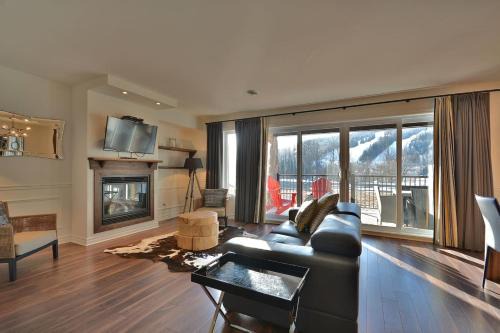 Condo Luxueux au pied du Mont