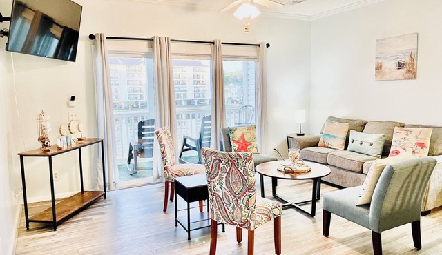 Condo on IntraCoastal Waterway- elevator, pool, host pups, near beach and golf.