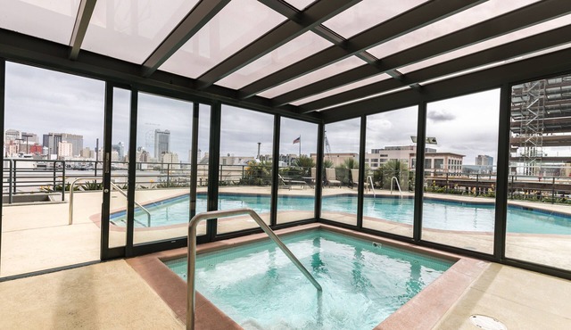 Condo with City View, Rooftop Pool, Security and Parking.