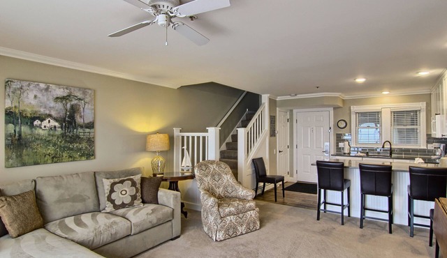 Condo with Lake Charlevoix Views | Private Beach Access | Gas Log Fireplace