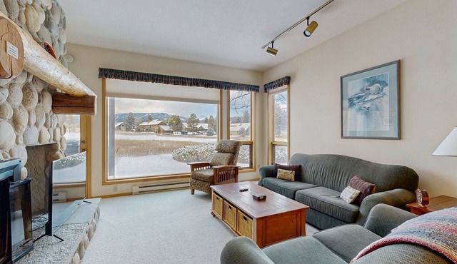 Condo with WiFi, fireplace, hot tub, & swimming pool