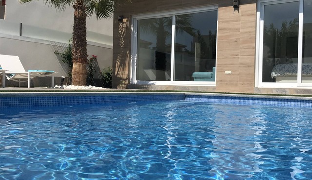 Contemporary new villa with private swimming pool and close to beaches
